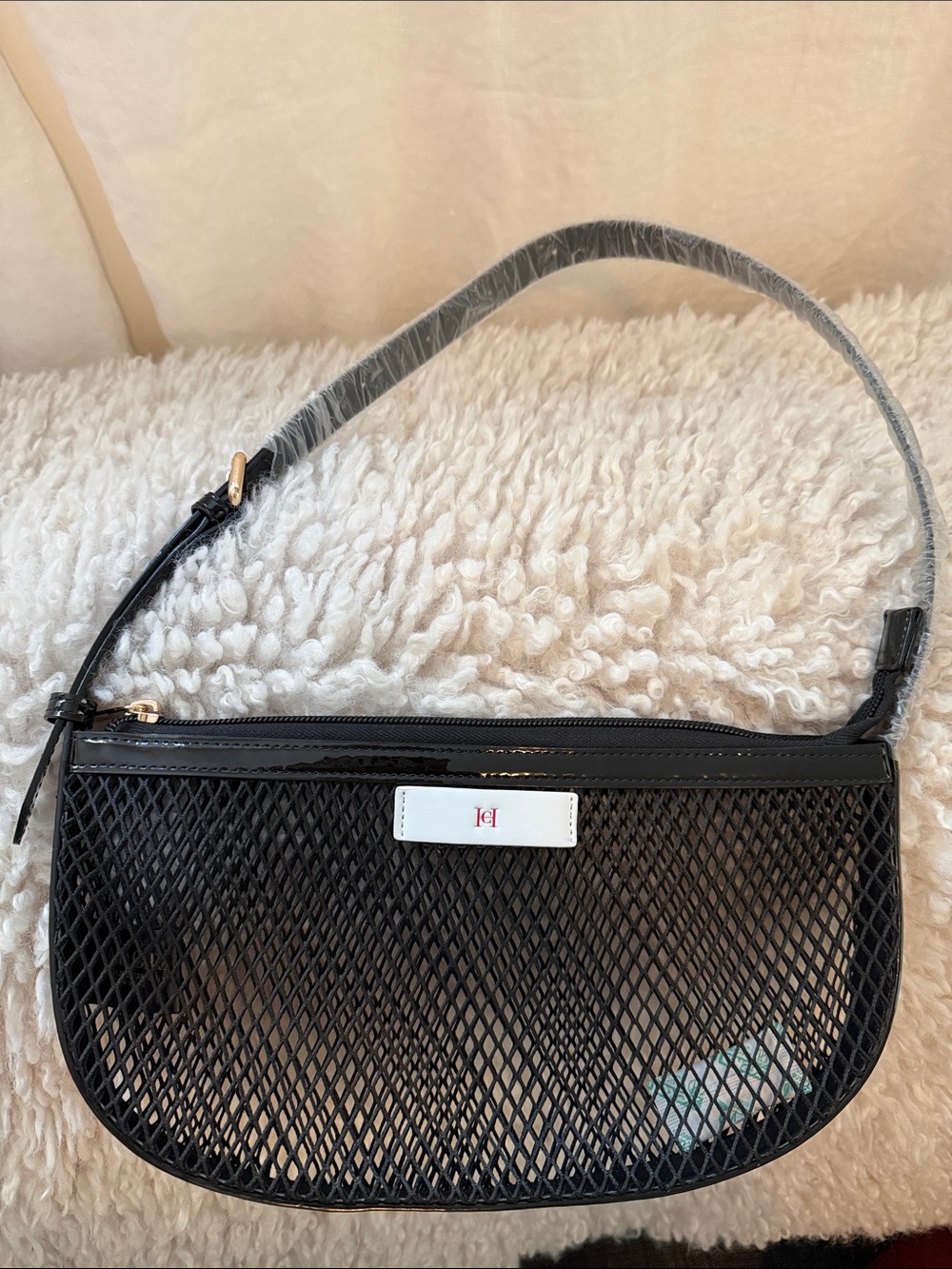 Carolina Herrera mesh mini handbag. Super cute and very chic!